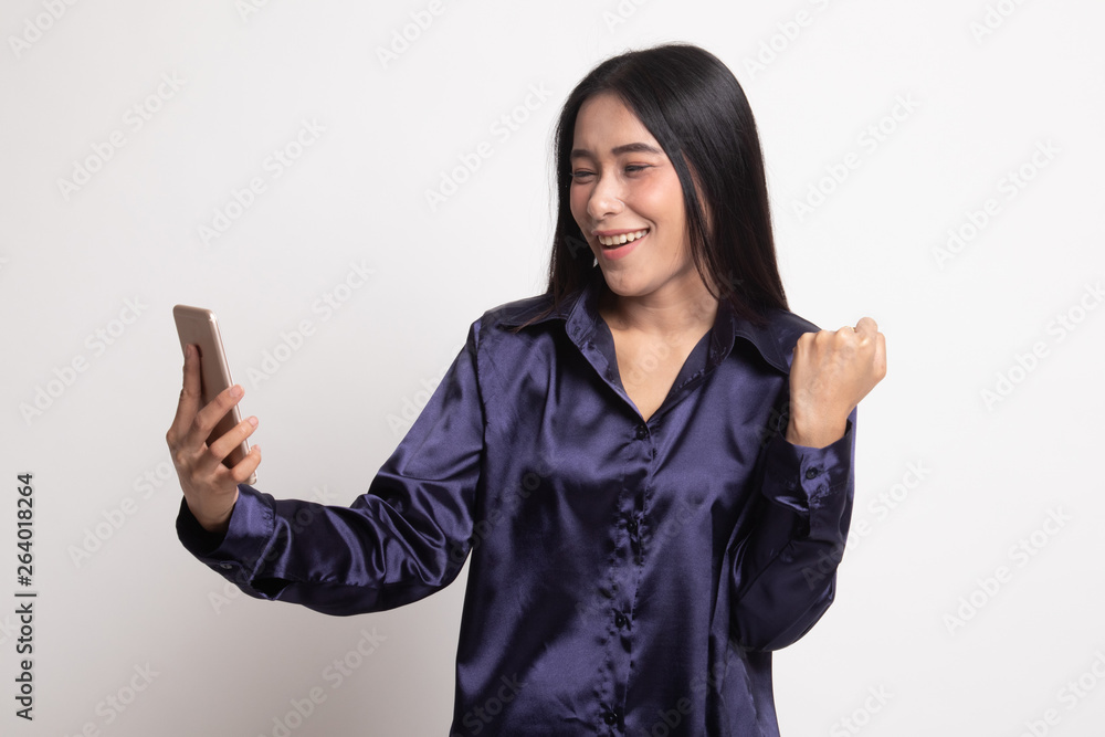 Successful young Asian woman with mobile phone. Successful young Asian woman with mobile phone.