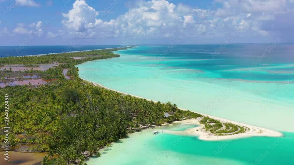 Drone aerial video of Fakarava atoll island motu Blue Lagoon, Teahatea and UNESCO Biosphere Reserve French Polynesia Tahiti, coral reef and Pacific Ocean. Tropical travel paradise in Tuamotus Islands. Drone aerial video of Fakarava atoll island motu Blue Lagoon, Teahatea and UNESCO Biosphere Reserve French Polynesia Tahiti, coral reef and Pacific Ocean. Tropical travel paradise in Tuamotus Islands.