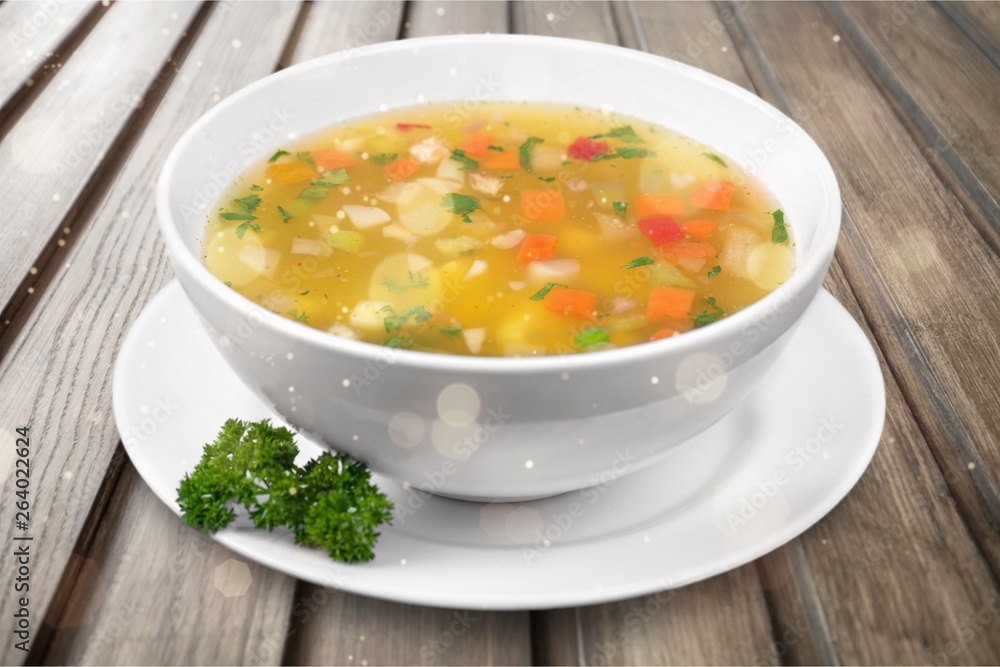 Bowl of vegetables delicious soup, close-up view Bowl of vegetables delicious soup, close-up view