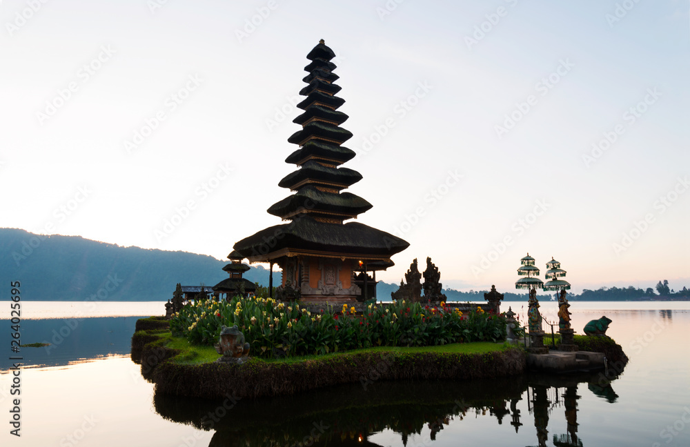 Peaceful atmosphere in early morning during sunrise over Pura Ulun Danu temple the Iconic of Bali, lake Bratan, Bali, Indonesia. Peaceful atmosphere in early morning during sunrise over Pura Ulun Danu temple the Iconic of Bali, lake Bratan, Bali, Indonesia.