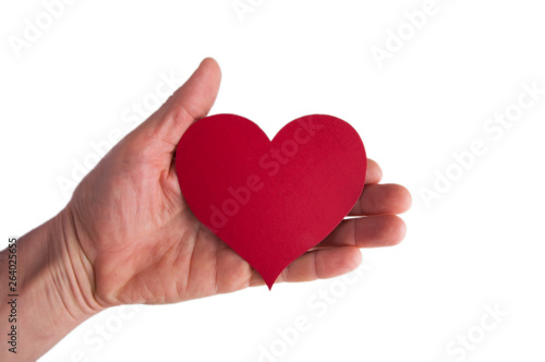 big red heart of paper in hand on white background