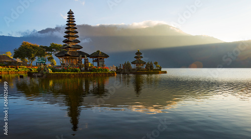 Peaceful atmosphere in early morning during sunrise over Pura Ulun Danu temple the Iconic of Bali  lake Bratan  Bali  Indonesia.