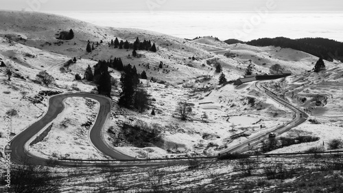 Mountain road with curves in winter season © elleonzebon