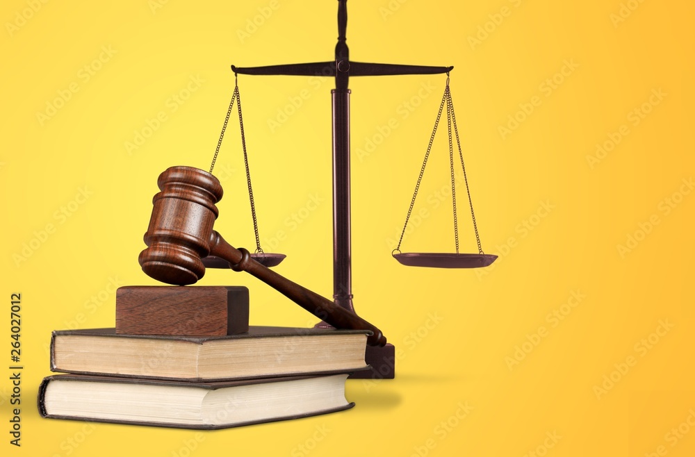Justice Scales and books and wooden gavel on table. Justice concept Justice Scales and books and wooden gavel on table. Justice concept