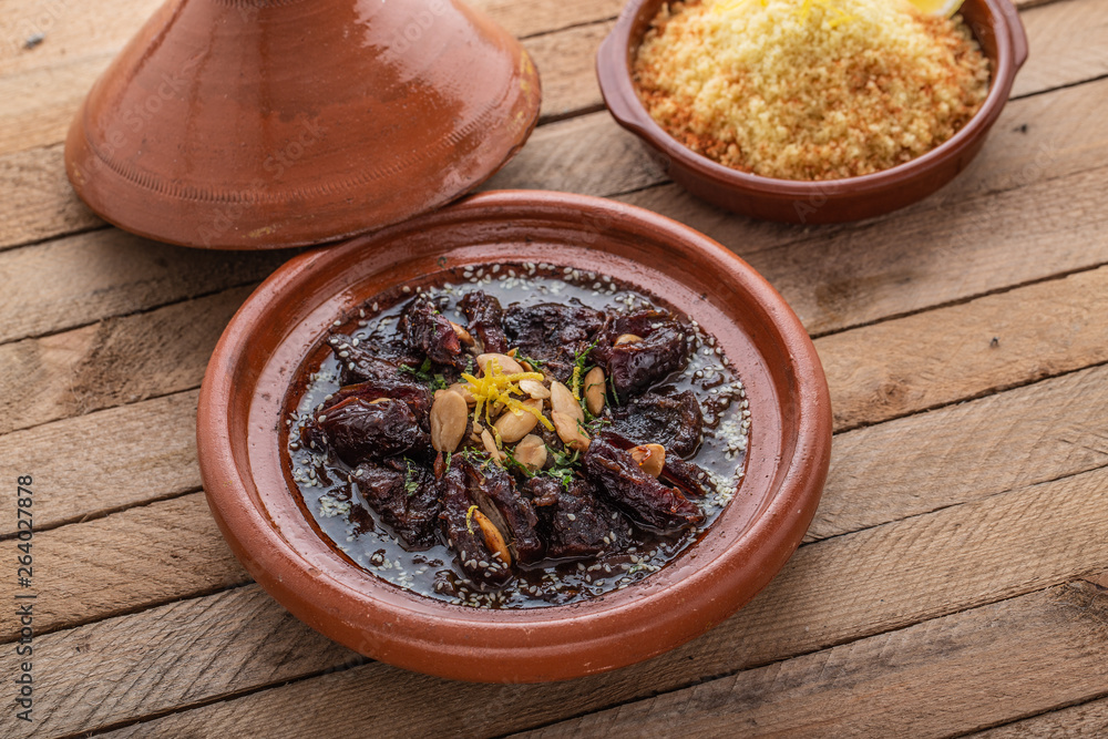 TAjine of beef with dates and almonds, copy space