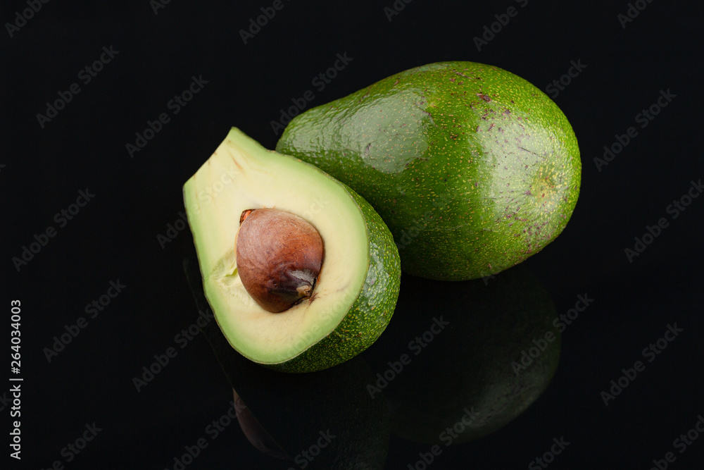 Avocado on black background . Symbol or Fresh Organic Fruit or vagitable for Healthy Lifestyle Concept