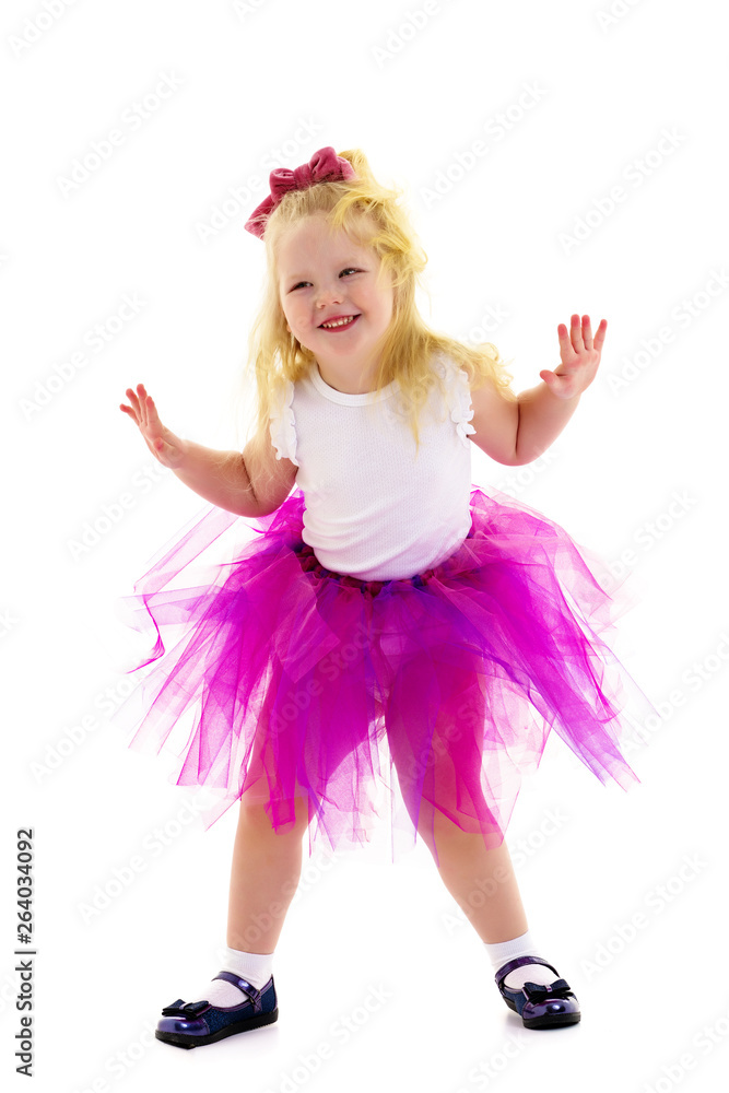 Little girl ballerina performs dance. Little girl ballerina performs dance.