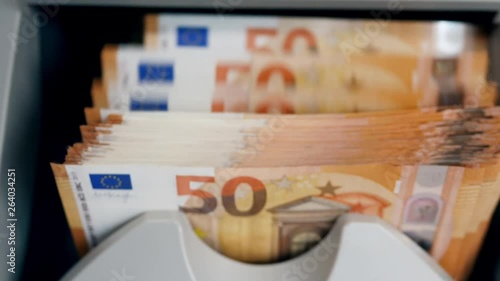 Wallpaper Mural Calculating machine is counting euro banknotes Torontodigital.ca