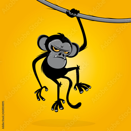 angry monkey hanging on a liana