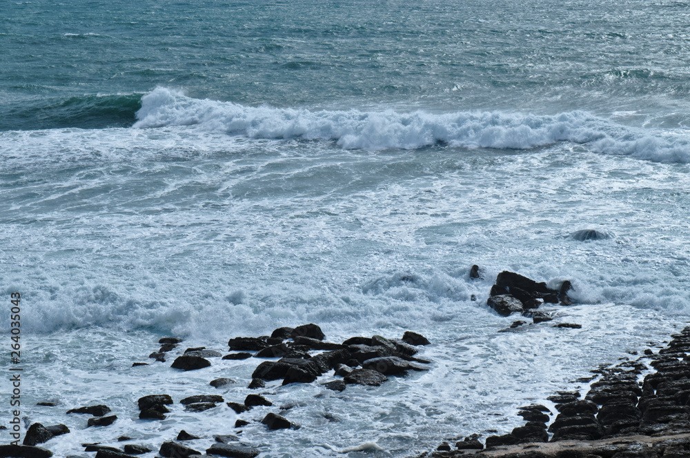 Sea, Waves and Rocks in Consolacao Beach. Peniche, Portugal