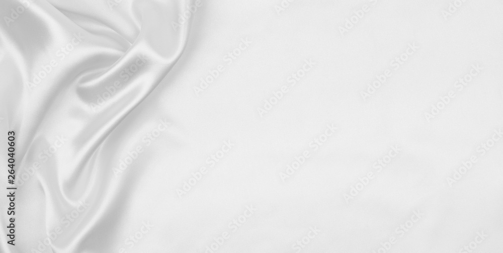 Smooth elegant white silk or satin luxury cloth texture as wedding background. Luxurious background design Smooth elegant white silk or satin luxury cloth texture as wedding background. Luxurious background design