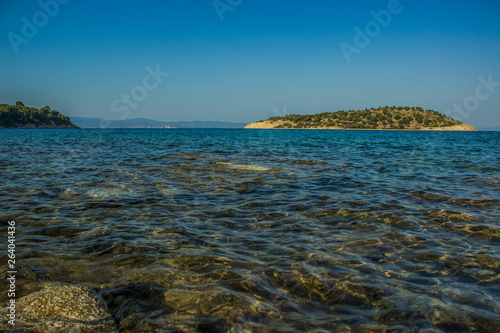 south European scenic landscape Aegean sea bay picturesque island view with water surface foreground in fresh spring season weather time