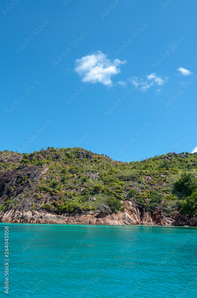 view of the rocky coastline of the Marine National Park of Curieuse island, Seychelles