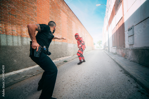 Tactical police training. Man with anti-shock clothing.