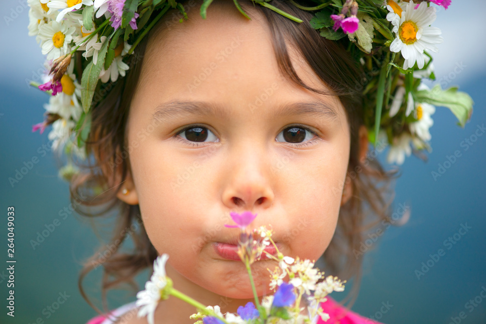 cute girl with flower crown smiling and having fun on meadow cute girl with flower crown smiling and having fun on meadow