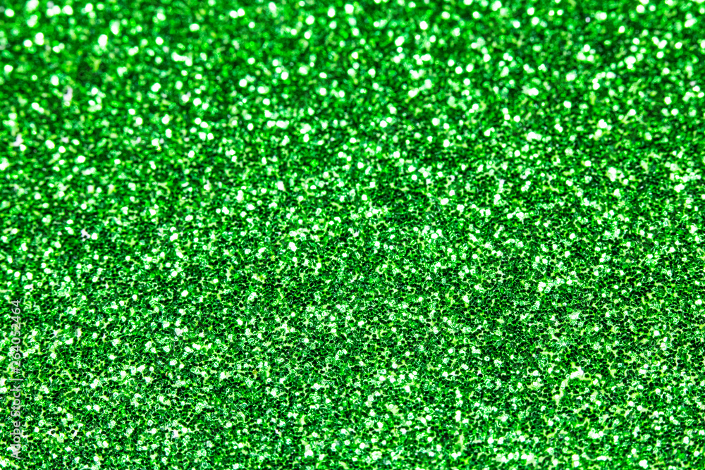 Close Up of Green Glitter with Bokeh For Background Close Up of Green Glitter with Bokeh For Background