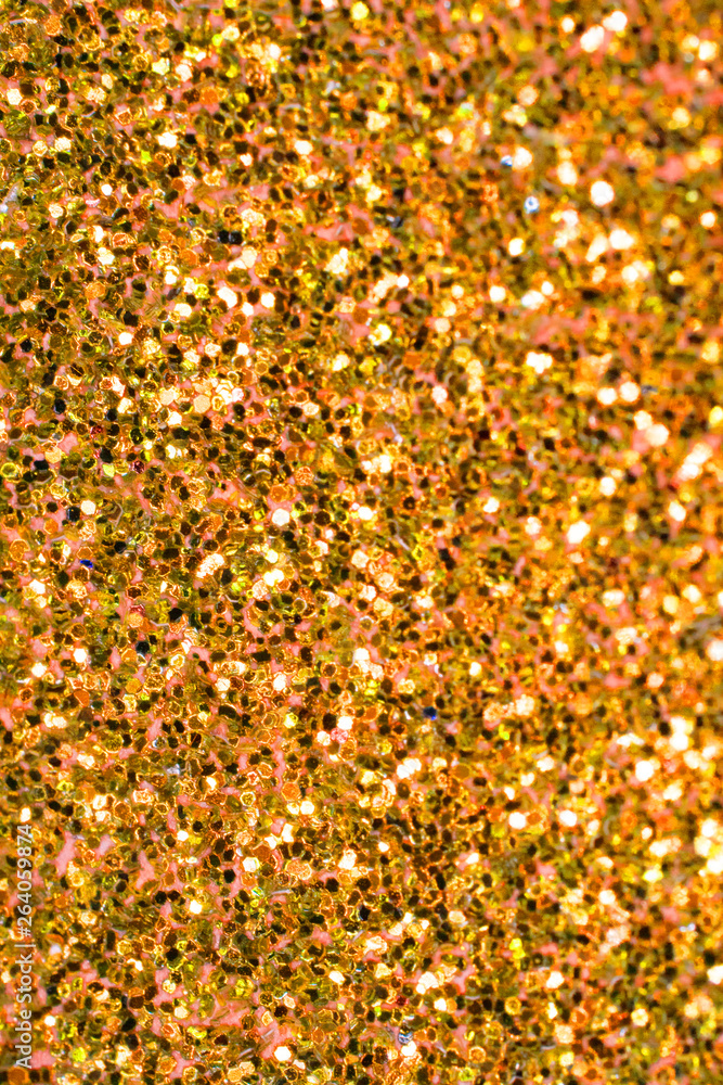 Close Up of Gold Yellow Glitter with Bokeh For Background