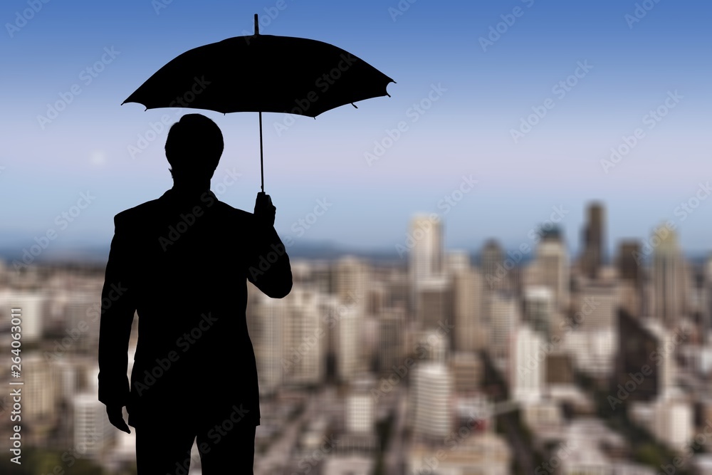 Portrait of businessman with umbrella on background Portrait of businessman with umbrella on background