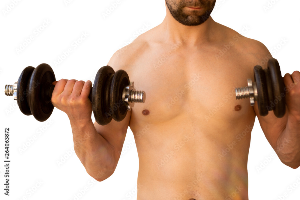a man with a bare torso of medium build raises his arms with dumbbells, the concept of sport and a healthy lifestyle a man with a bare torso of medium build raises his arms with dumbbells, the concept of sport and a healthy lifestyle