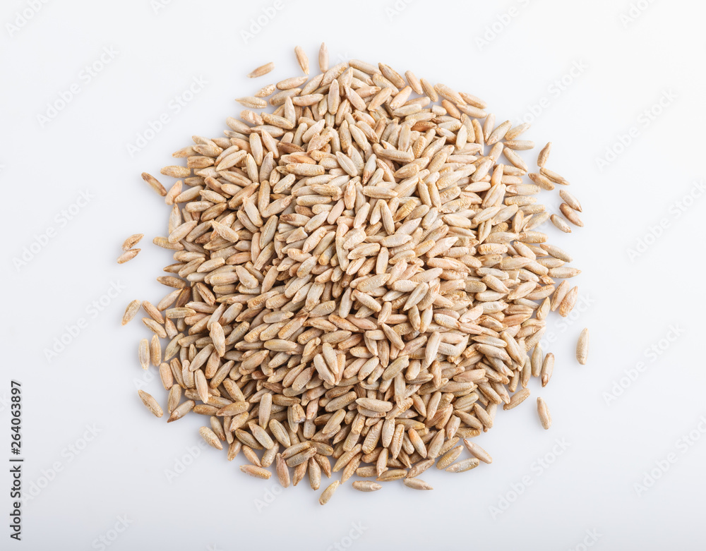 Heap of rye grains isolated on white background. Heap of rye grains isolated on white background.
