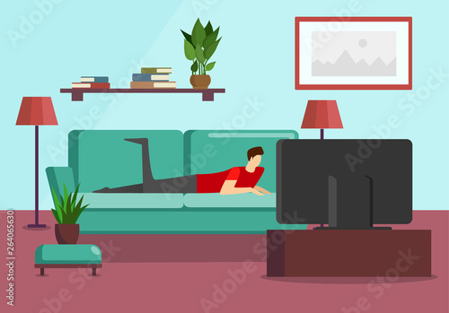 Young Man Watch Television Program Lying on Sofa