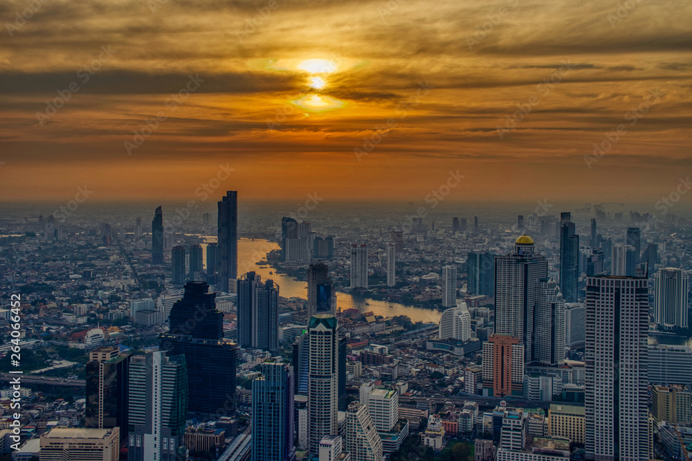 Sunset over Bangkok at the top of  King Power MahaNakhon Tower