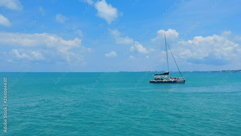 Aerial Forward Slow: Small Boat in the Waters of Bermuda on a Sunny Day in Spanish Point, Bermuda Aerial Forward Slow: Small Boat in the Waters of Bermuda on a Sunny Day in Spanish Point, Bermuda