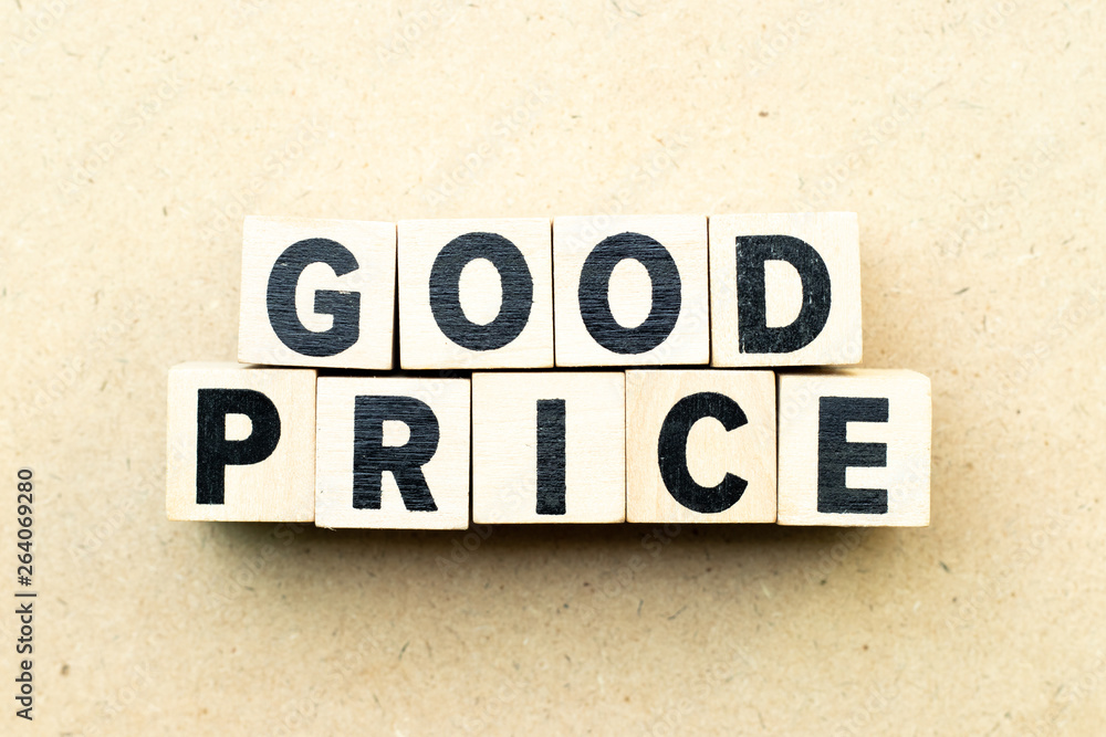 Letter block in word good price on wood background Letter block in word good price on wood background