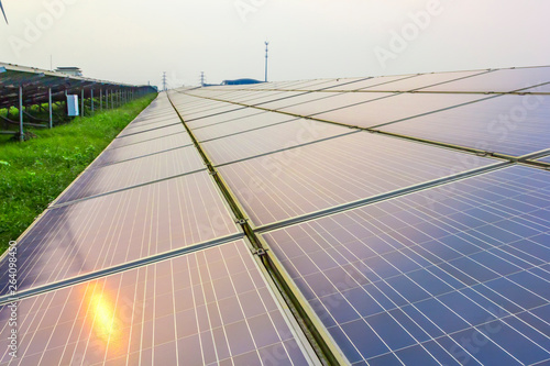 Photovoltaic panels on the sunrise © 一飞 黄