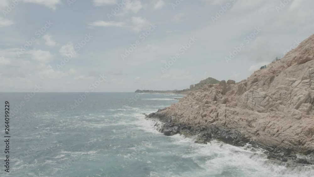 Aerial shot of a cliff in the coastline Aerial shot of a cliff in the coastline