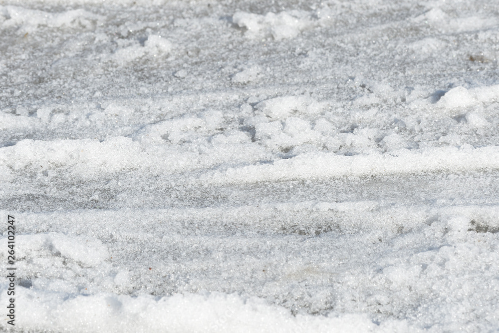 Obraz premium Early spring snow texture close up. Abstract natural background