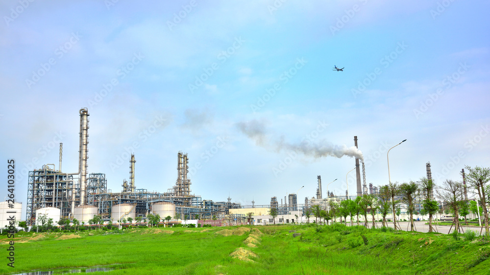 Refinery plant under the background of blue sky white clouds