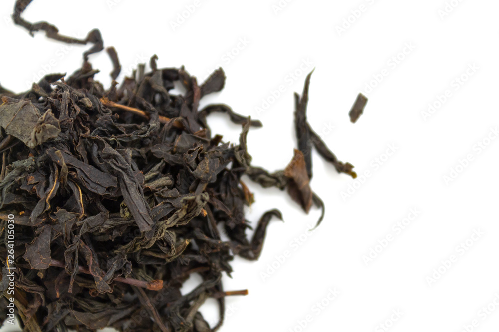 Fototapeta premium black tea, large leaf on a white background