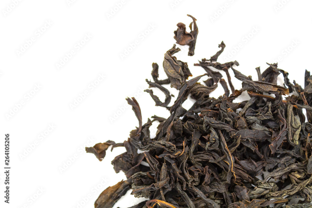Obraz premium black tea, large leaf on a white background
