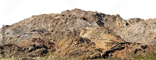 A large long  hill of construction sand, clay and soil  with traces of tractor wheels