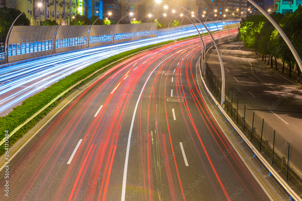 The cars on the highway light trails in Shanghai, China The cars on the highway light trails in Shanghai, China