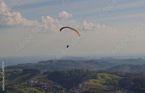 a sunny day to fly from paraglider