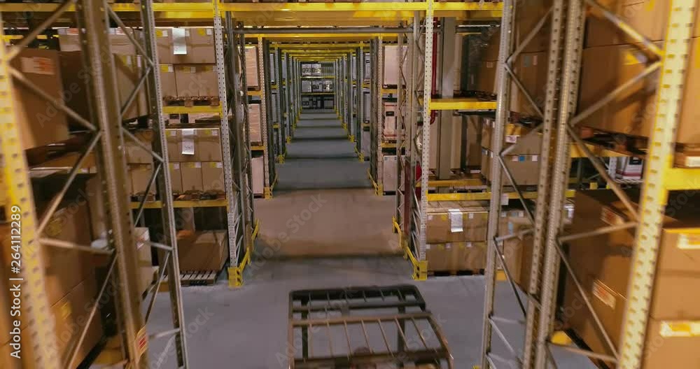 Workflow in a warehouse, active work in a warehouse, forklifts in a