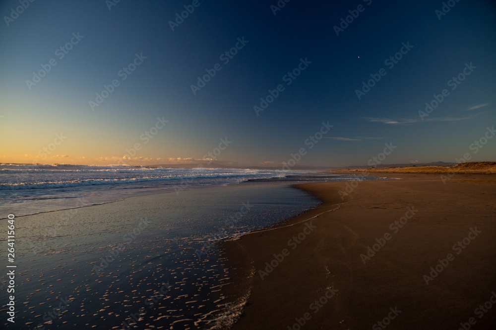 Moss Landing beach California sunset