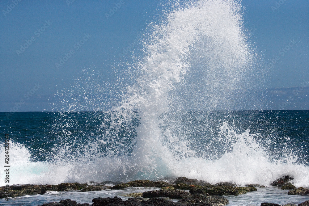 Waves crashing against the rocks. Galapagos Islands. Landscape. Ecuador. Pacific Ocean. South America.