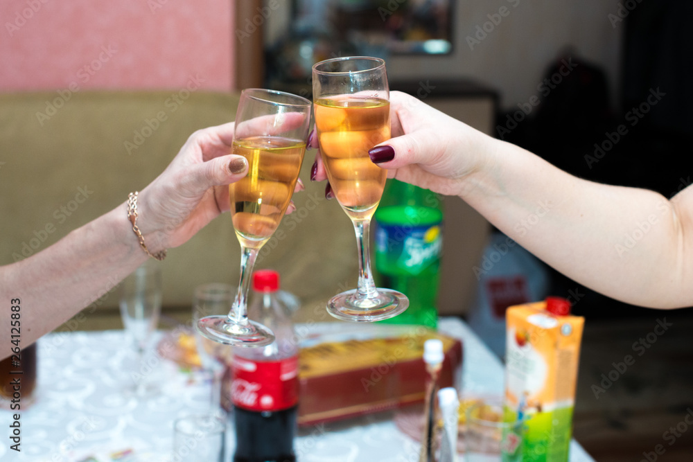 two glasses of wine at the party two glasses of wine at the party