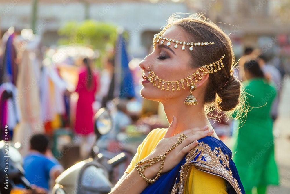 portrait indian beautiful Caucasian woman in traditional blue dress ...