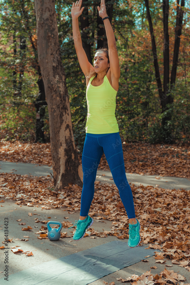 Woman Exercising Outdoors, High Intensity Interval Training.