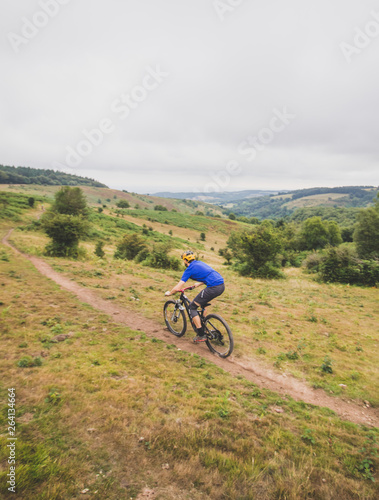 Mountain biker enjoying out in hills