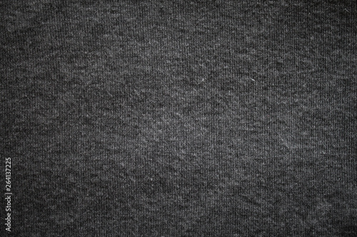 dark grey background. abstract texture of fleecy knitted fabric.