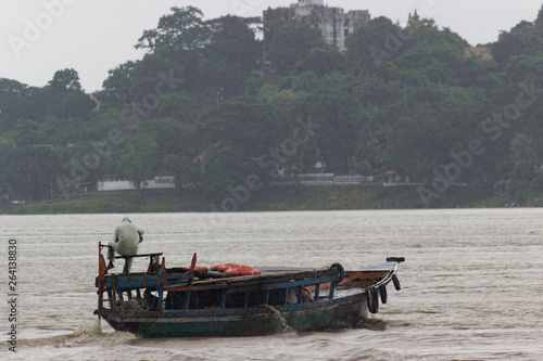 fishing boat during strong monsoon and floods, india