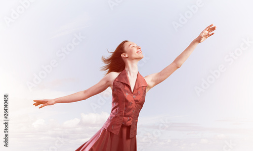 Concept of freedom and happiness with girl enjoying this life