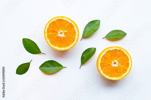 Fresh orange citrus fruits with leaves on white
