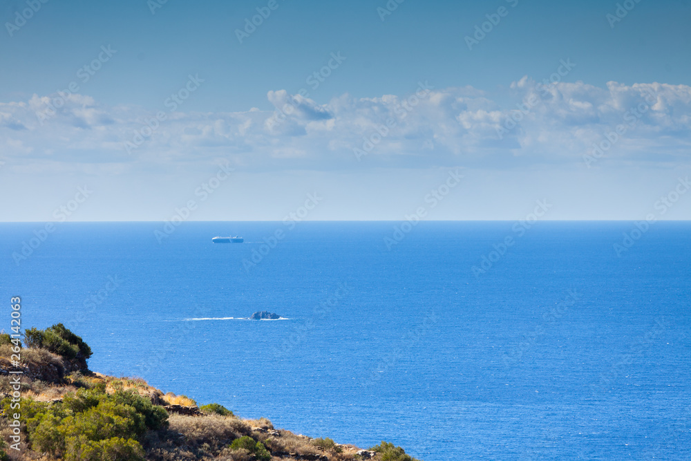 Seascape with ship on water surface