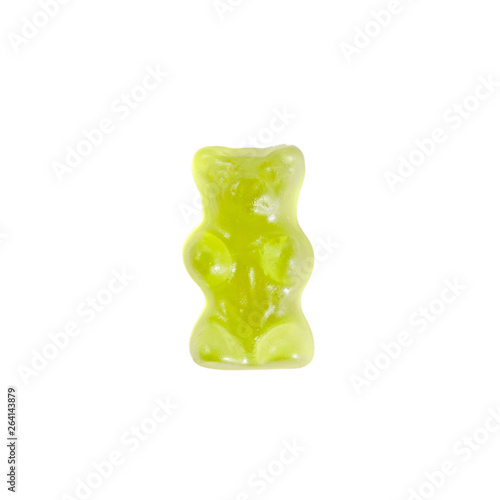 Green gummy bear isolated on white photo